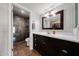 Bathroom featuring a walk-in shower, a modern vanity, and stylish fixtures at 4126 E Windrose Dr, Phoenix, AZ 85032