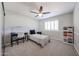 Cozy bedroom with carpet flooring, a ceiling fan, and a peaceful atmosphere at 4126 E Windrose Dr, Phoenix, AZ 85032