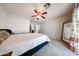 Bright bedroom featuring carpet flooring, a ceiling fan, and a peaceful ambiance at 4126 E Windrose Dr, Phoenix, AZ 85032