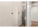 Utility room with a water heater and access to the rest of the house at 4147 W Reade Ave, Phoenix, AZ 85019