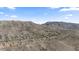 Panoramic view of a community nestled amongst rolling hills and mountains at 421 W Mountain Sage Dr, Phoenix, AZ 85045