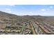 Elevated aerial view of the community and the surrounding mountains at 421 W Mountain Sage Dr, Phoenix, AZ 85045