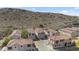 Aerial view showcasing the tile roofs and desert landscaping of this residential neighborhood at 421 W Mountain Sage Dr, Phoenix, AZ 85045