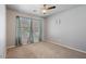Bedroom featuring carpet, ceiling fan, and natural light from the window at 421 W Mountain Sage Dr, Phoenix, AZ 85045