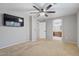Main bedroom featuring neutral walls and an attached bathroom at 421 W Mountain Sage Dr, Phoenix, AZ 85045