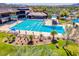 Community swimming pool with lap lanes and ample lounge chairs, promoting relaxation and exercise at 43510 N 44Th Ave, New River, AZ 85087