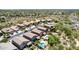 Desert homes showcasing tile roofs, swimming pools, and mature landscaping in a planned community at 4426 E Coyote Wash Dr, Cave Creek, AZ 85331