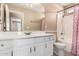 Bright bathroom featuring a vanity with white cabinets and a shower-tub combination at 4426 E Coyote Wash Dr, Cave Creek, AZ 85331