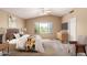 Bedroom features a large window, ceiling fan, and en-suite bathroom at 4426 E Coyote Wash Dr, Cave Creek, AZ 85331