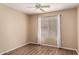 Bright bedroom with wood flooring, a ceiling fan and a window providing natural light at 4426 E Coyote Wash Dr, Cave Creek, AZ 85331