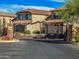 Decorative gate welcomes residents to this community with tile roof homes at 4426 E Coyote Wash Dr, Cave Creek, AZ 85331