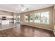 Open living area with windows overlooking the backyard and an attached kitchen at 4426 E Coyote Wash Dr, Cave Creek, AZ 85331