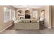 Comfortable living room featuring built-in shelves and a cozy seating area at 4426 E Coyote Wash Dr, Cave Creek, AZ 85331