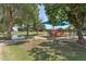 Neighborhood playground for children with shade, play equipment, and grassy fields at 4734 W Golden Ln, Glendale, AZ 85302