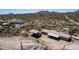 Desert landscape with a single-story home, car port and beautiful mountain views at 48451 N 27Th Ave, New River, AZ 85087