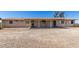 Exterior shot featuring a covered patio area in the backyard of a home at 48451 N 27Th Ave, New River, AZ 85087