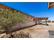 An exterior shot featuring a covered patio in the backyard of a home at 48451 N 27Th Ave, New River, AZ 85087