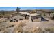 Aerial view showcases the sprawling property with auxiliary structure at 48451 N 27Th Ave, New River, AZ 85087