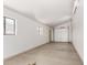 View of the spacious garage with two windows and mini-split AC unit at 48451 N 27Th Ave, New River, AZ 85087