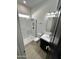 Well-lit bathroom with a glass-enclosed shower, modern fixtures, and stylish finishes at 5088 S Ponderosa Dr, Gilbert, AZ 85298