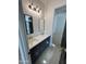 Elegant bathroom featuring a double vanity with modern fixtures and tasteful lighting at 5088 S Ponderosa Dr, Gilbert, AZ 85298