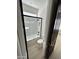 Modern bathroom with a shower-tub combination featuring glass enclosure and sleek fixtures at 5088 S Ponderosa Dr, Gilbert, AZ 85298