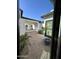 Charming courtyard featuring tiled flooring and a covered walkway with beautiful arches at 5088 S Ponderosa Dr, Gilbert, AZ 85298