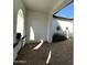 Private courtyard with stylish paving and decorative wall art providing a relaxing outdoor space at 5088 S Ponderosa Dr, Gilbert, AZ 85298
