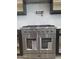 Gourmet kitchen features a stainless steel range with a hood and pot filler for cooking convenience at 5088 S Ponderosa Dr, Gilbert, AZ 85298