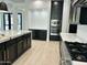 Gourmet kitchen with stainless steel appliances, custom cabinetry, and open layout at 5088 S Ponderosa Dr, Gilbert, AZ 85298