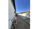 A practical side yard with gravel and pavers, providing utility and low-maintenance access to backyard at 5088 S Ponderosa Dr, Gilbert, AZ 85298