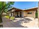Charming backyard featuring covered patio and landscaped garden at 518 N Cheri Lynn Dr, Chandler, AZ 85225
