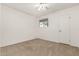 Bedroom featuring carpet, a ceiling fan, window, closet and neutral walls at 518 N Cheri Lynn Dr, Chandler, AZ 85225
