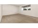 A bright bedroom with neutral carpet at 518 N Cheri Lynn Dr, Chandler, AZ 85225