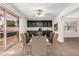 The dining room features a ceiling fan and a built-in cabinet with glass doors at 518 N Cheri Lynn Dr, Chandler, AZ 85225