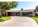 Single-story home with a spacious driveway and mature trees at 518 N Cheri Lynn Dr, Chandler, AZ 85225