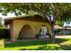 Single-story home with a spacious driveway and mature trees at 518 N Cheri Lynn Dr, Chandler, AZ 85225