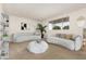 Bright living room with two sofas, a modern coffee table and neutral décor at 518 N Cheri Lynn Dr, Chandler, AZ 85225