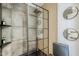 Modern bathroom with black framed shower and sleek design at 5239 E Waltann Ln, Scottsdale, AZ 85254