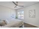 Comfortable bedroom with polished concrete floors and plenty of natural light at 5239 E Waltann Ln, Scottsdale, AZ 85254
