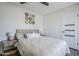 Cozy bedroom featuring decorative wall art and comfortable furnishings at 5239 E Waltann Ln, Scottsdale, AZ 85254