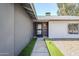 Pathway leading to front door of home, with low voltage lighting and desert landscaping at 5239 E Waltann Ln, Scottsdale, AZ 85254