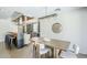 Open-concept kitchen and dining area with modern appliances, stylish lighting, and spacious design at 5239 E Waltann Ln, Scottsdale, AZ 85254
