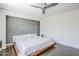 Comfortable main bedroom with a platform bed and a modern ceiling fan at 5239 E Waltann Ln, Scottsdale, AZ 85254