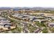 An aerial view shows the community's winding roads and well-kept homes at 5954 E Cat Balue Dr, Phoenix, AZ 85054