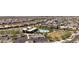 Aerial view of the community featuring a clubhouse, pool, and surrounding homes at 5954 E Cat Balue Dr, Phoenix, AZ 85054