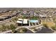 Aerial shot of community pool and clubhouse with ample parking at 5954 E Cat Balue Dr, Phoenix, AZ 85054