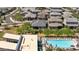 This aerial view highlights community pool and deck with relaxing lounge chairs at 5954 E Cat Balue Dr, Phoenix, AZ 85054