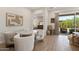Inviting dining room featuring a round table, comfortable seating, and plenty of natural light at 5954 E Cat Balue Dr, Phoenix, AZ 85054