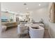 Bright dining area with access to the kitchen and views of the adjacent living spaces at 5954 E Cat Balue Dr, Phoenix, AZ 85054